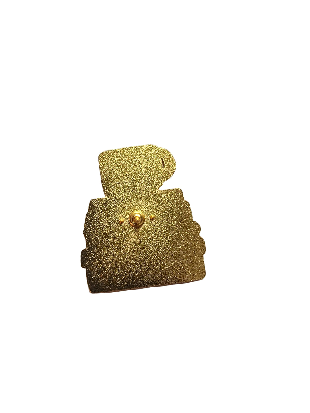 Gold-colored electronic component on a white surface 