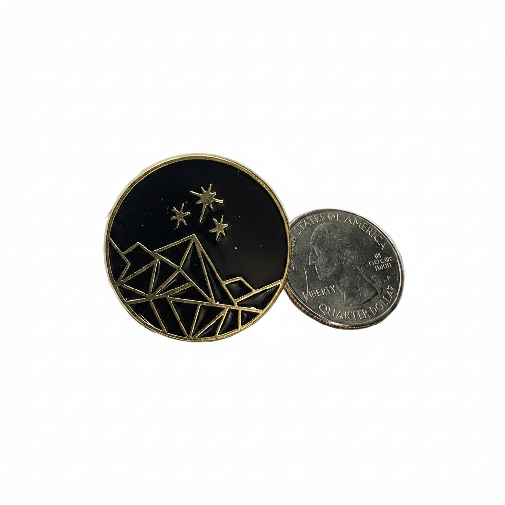 ACOTAR mt remiel enamel pin shown next to quarter for size reference actoar enamel pin dims 1 inch x 1 inch