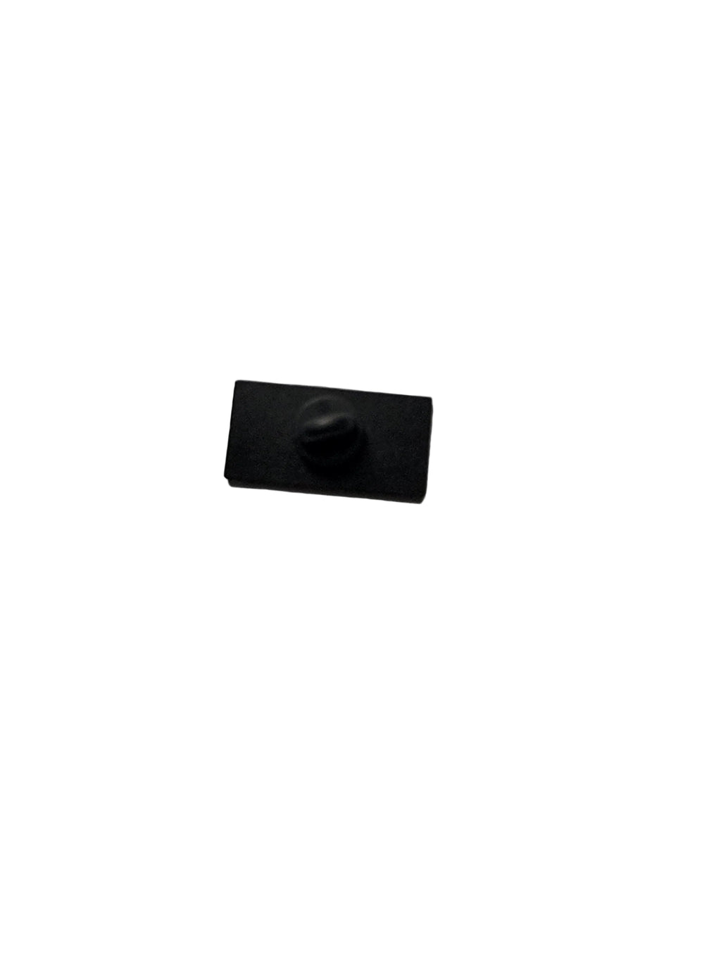 Small black rectangular object on a light gray background