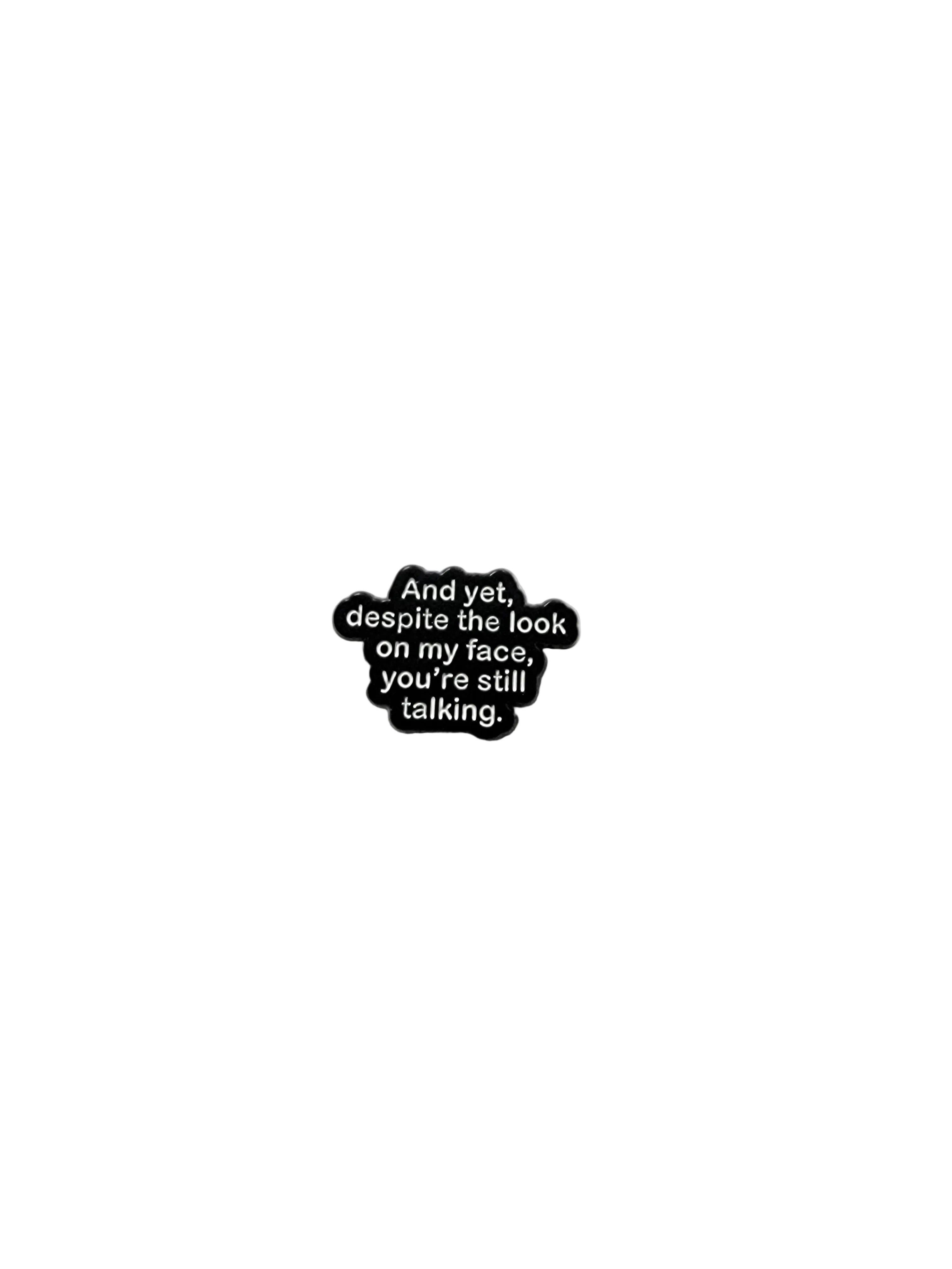 Black and white text pin on a white background