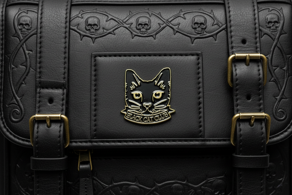 Black Cat Club Enamel Pin on backpack witchy accessory for customizing bags and school gear