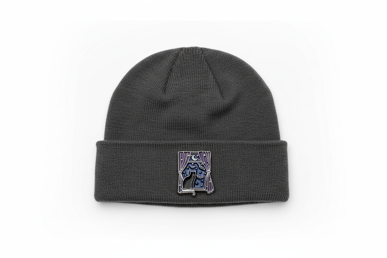 Black Cat Stary Night Enamel Pin worn on beanie hat alternative enamel pin for casual outfits and street wear