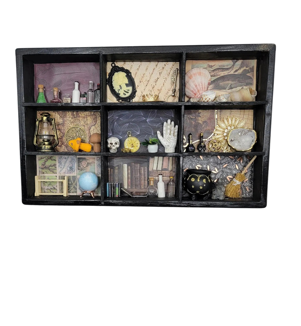 Decorative shelf with various items against a white wall