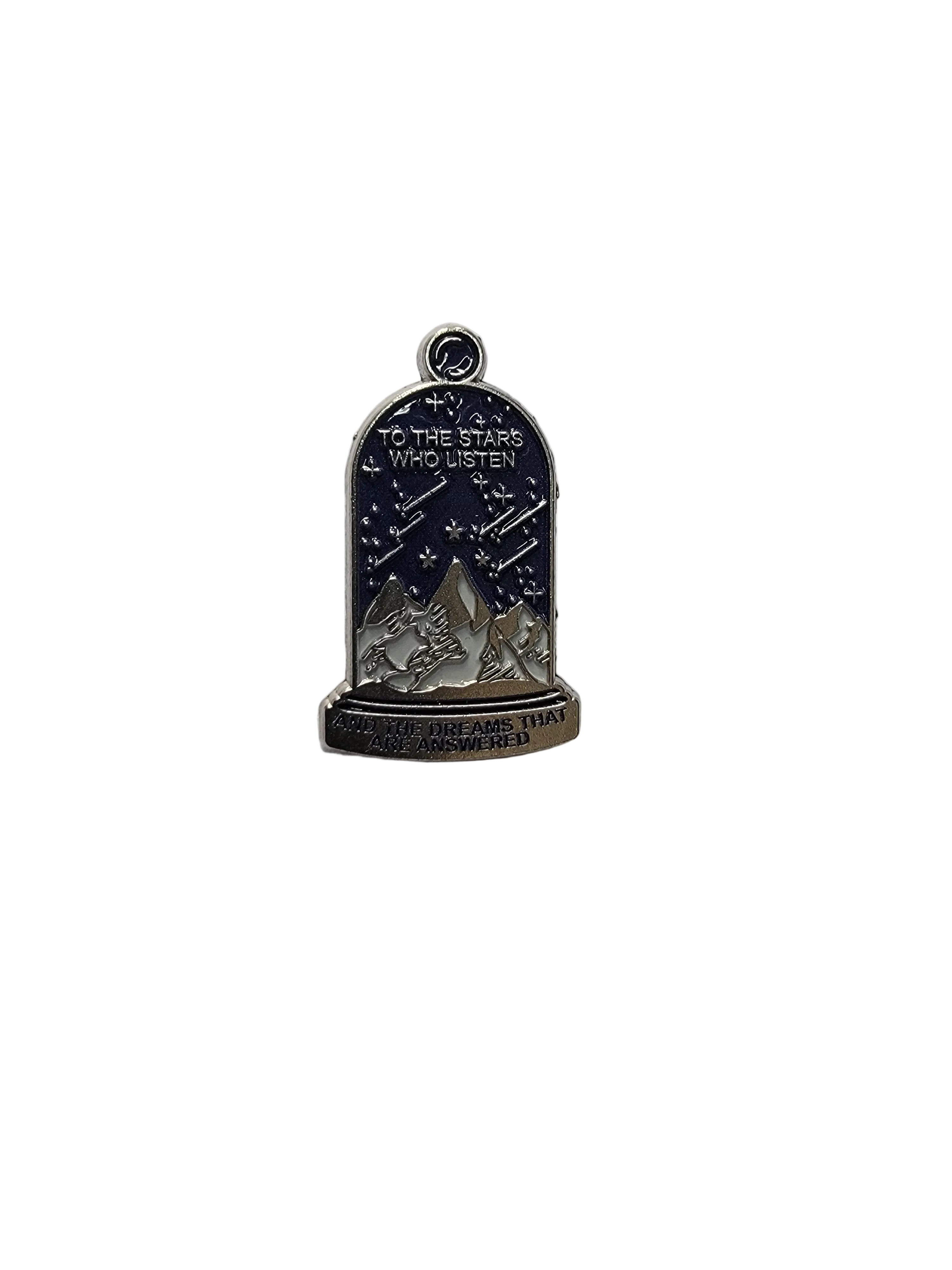 Silver pendant with star design on a white background