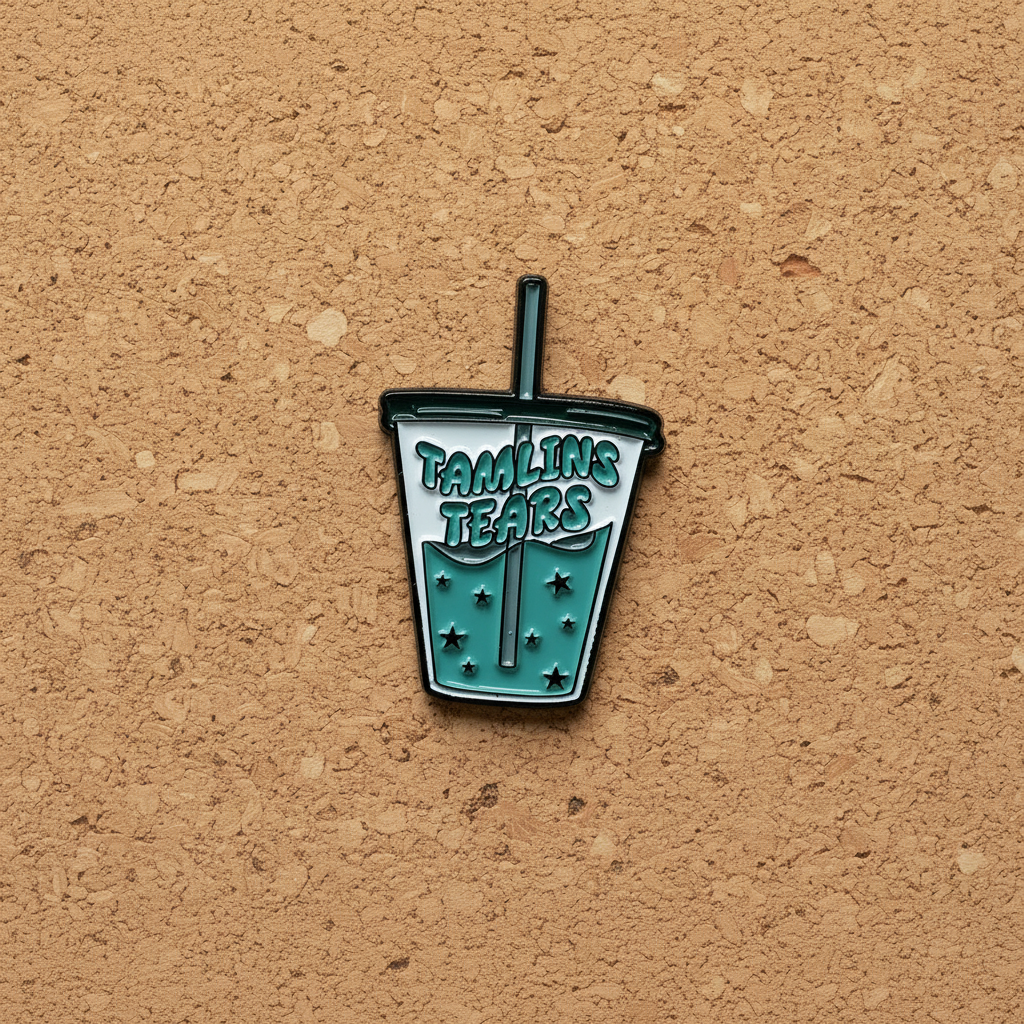 Tamlin's tears enamel pin displayed on cork board acotar enamel pin for collectors and display