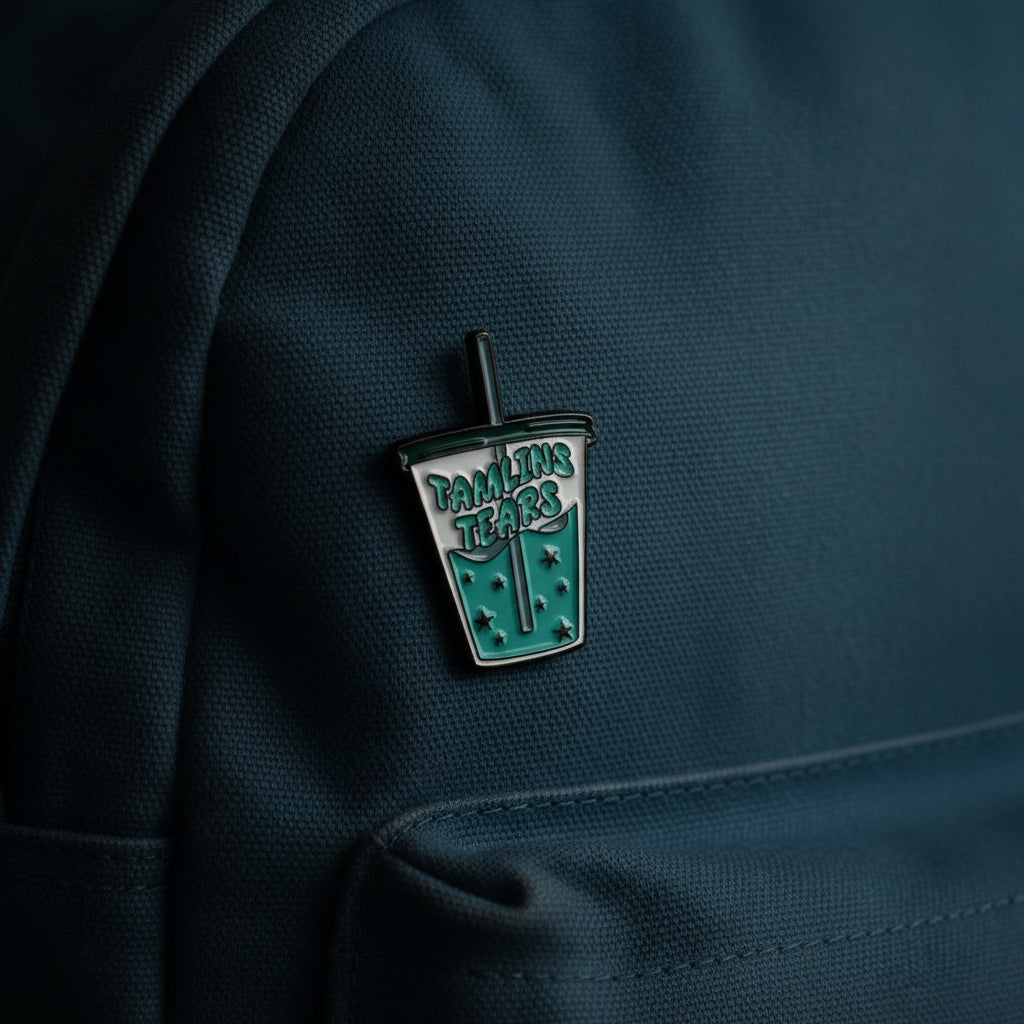 Tamlin's tears enamel pin on backpack funny accessory for customizing bags and school gear