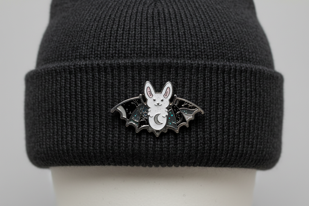 Cute Bat enamel pin worn on beanie hat witch enamel pin for casual outfits and street wear