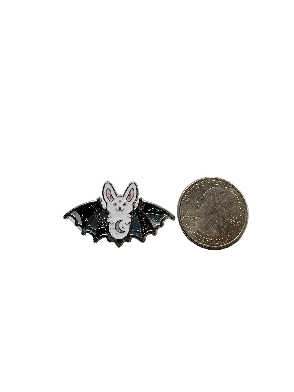 Cute Bat enamel pin shown next to quarter for size reference alternative enamel pin  1 7/16 in W x 7/8 in H