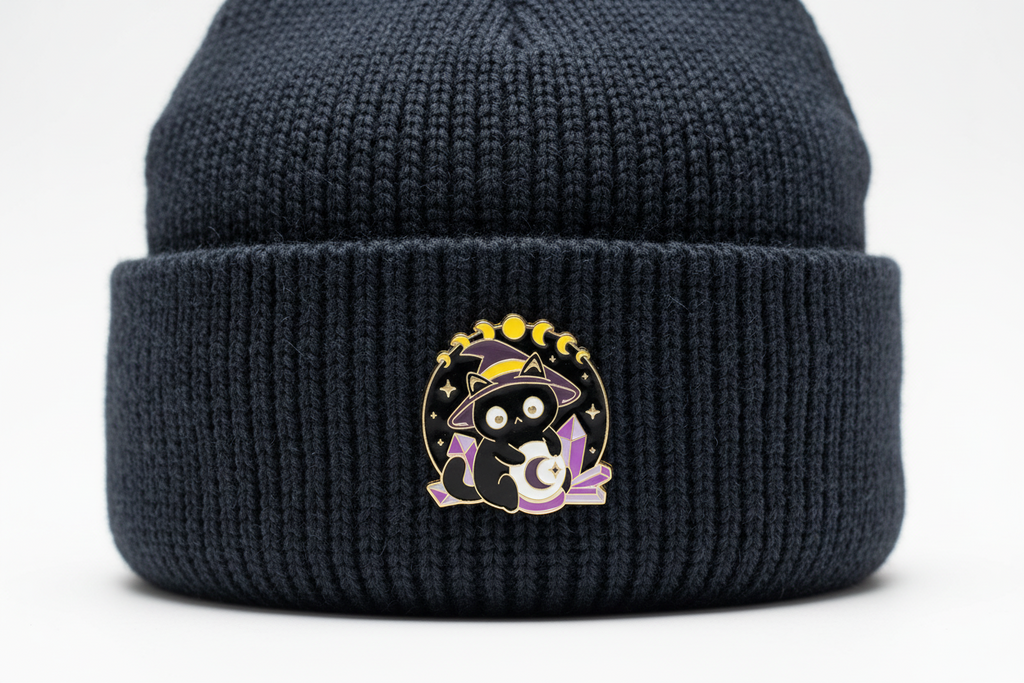 Cute Witchy Cat Enamel Pin worn on beanie hat alternative enamel pin for casual outfits and street wear
