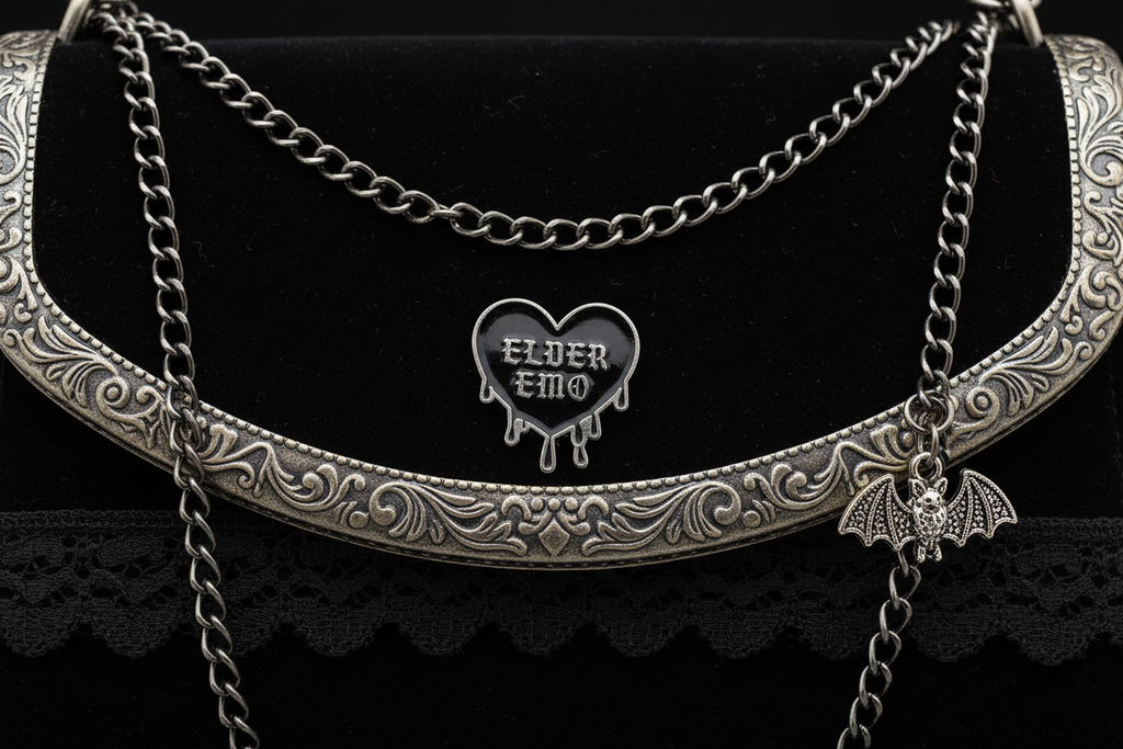 Elder Emo Enamel Pin attached to purse witchy brooch accessory for bags and personal style
