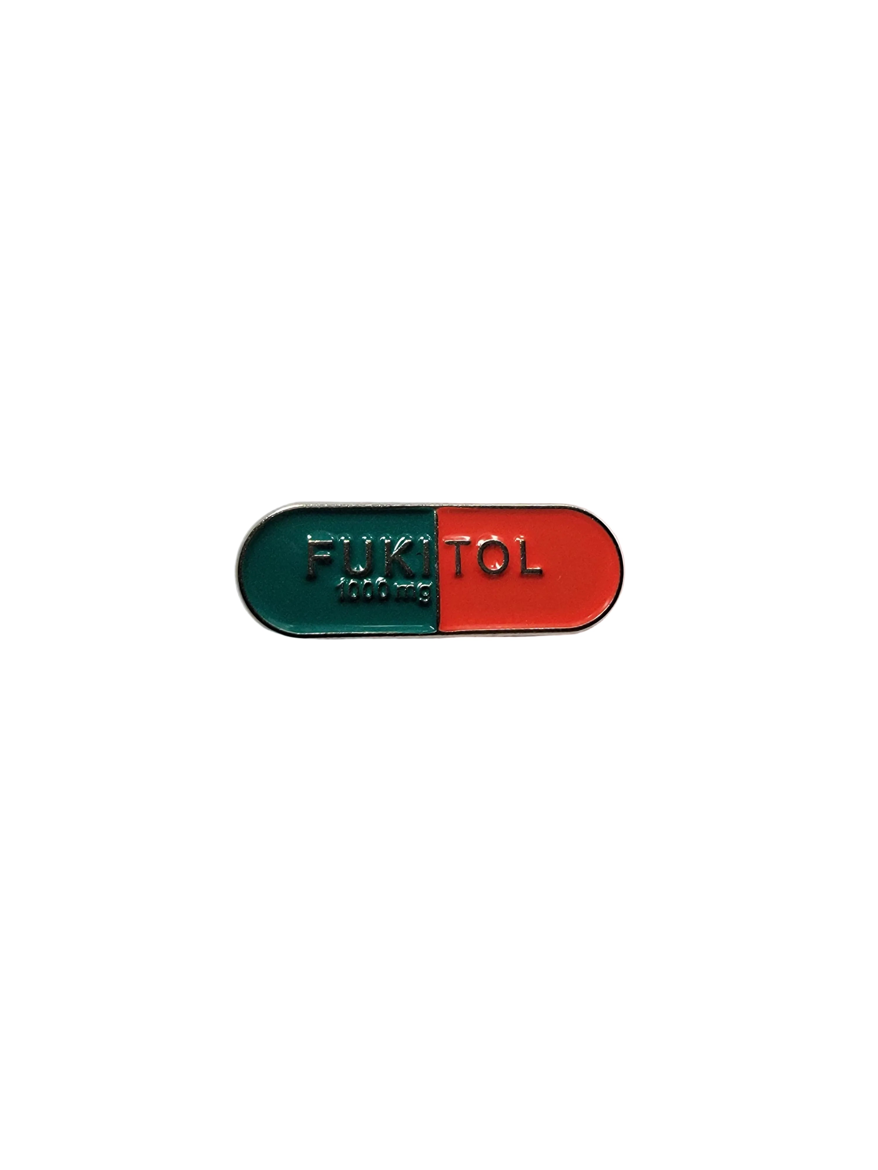 Pill-shaped object with red top and green bottom on a white background