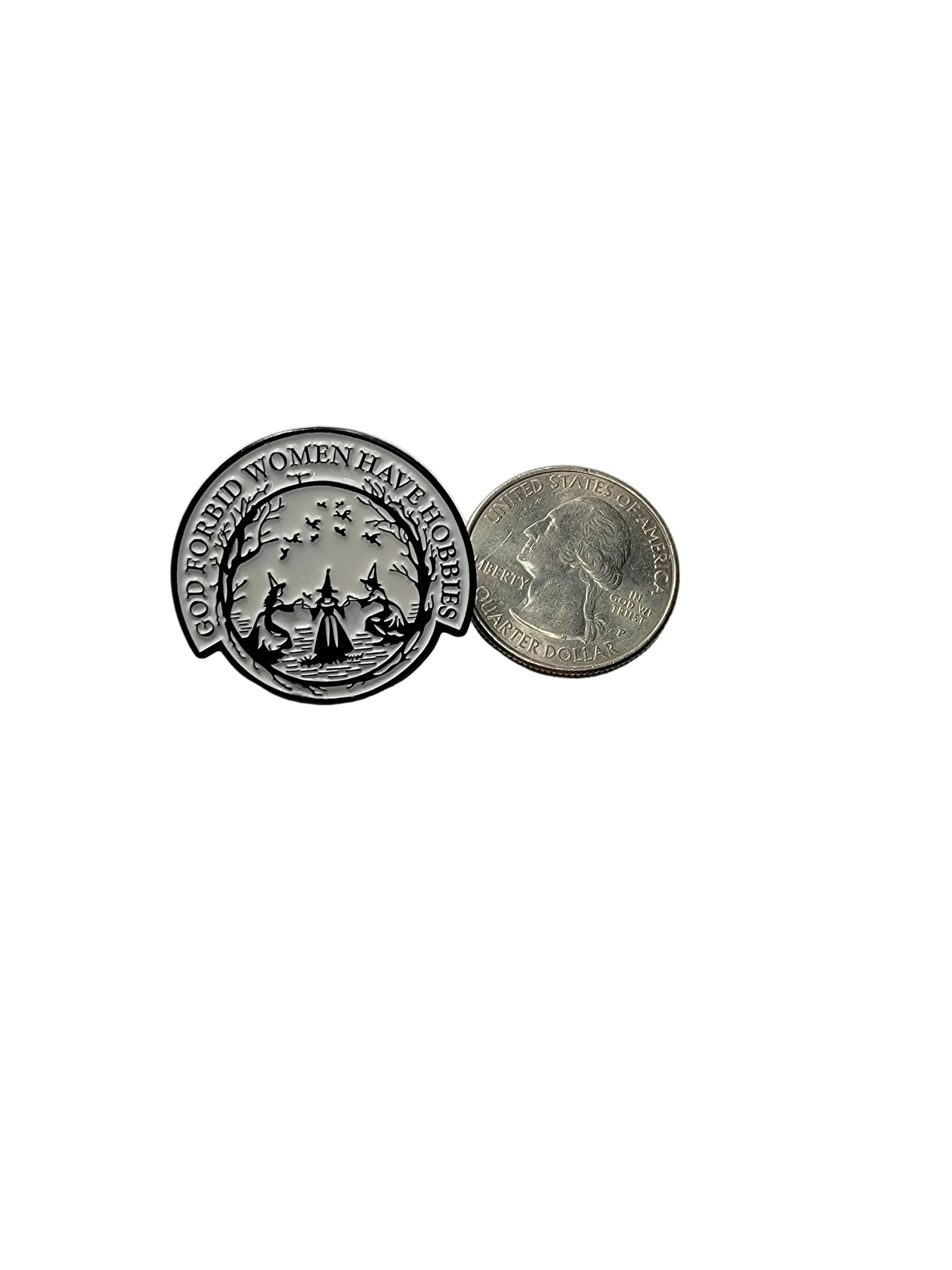 God forbid woman have hobbies enamel pin shown next to quarter for size reference goth enamel pin 1 1/4 x 1 inch. 