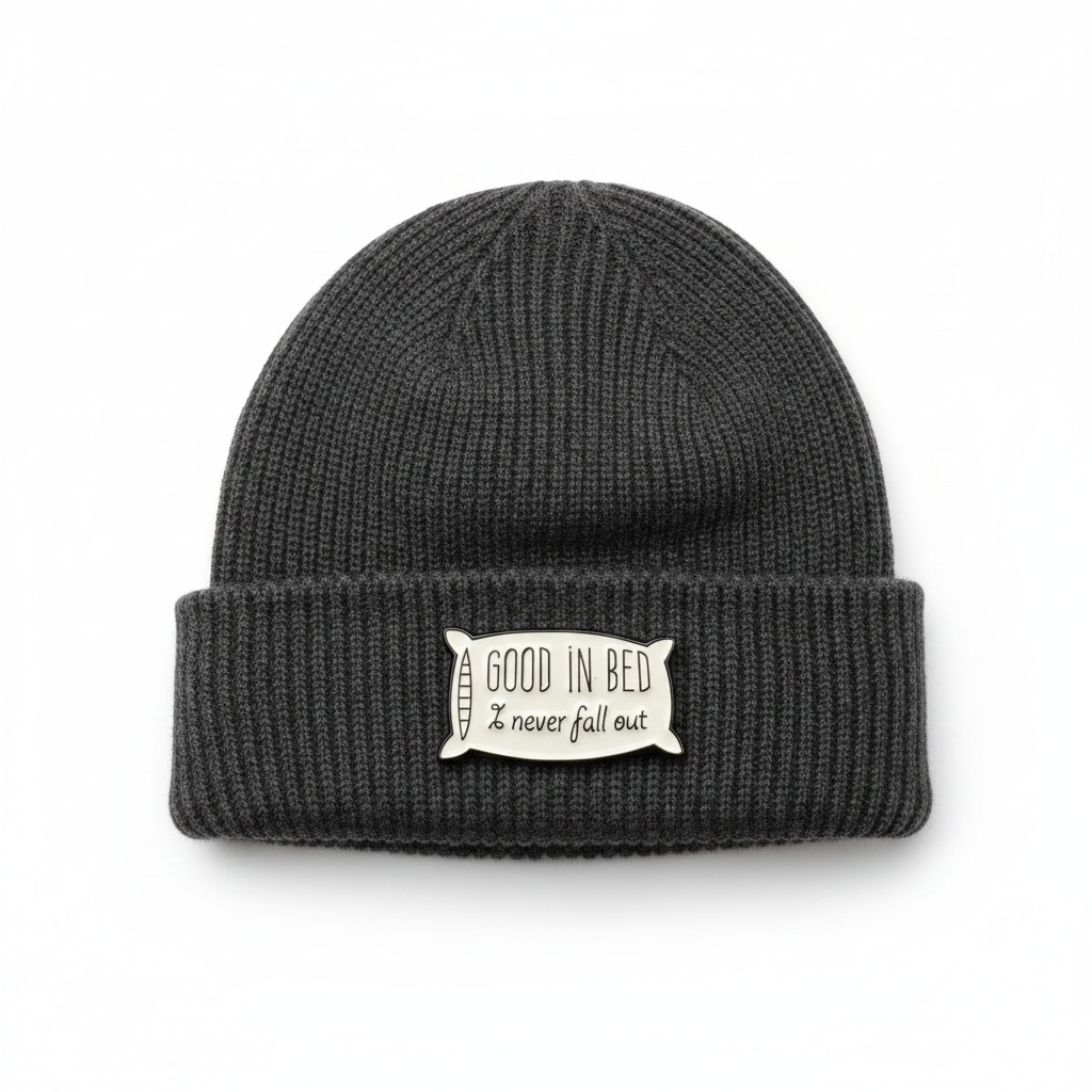 Good in bed enamel pin worn on beanie hat alternative enamel pin for casual outfits and street wear