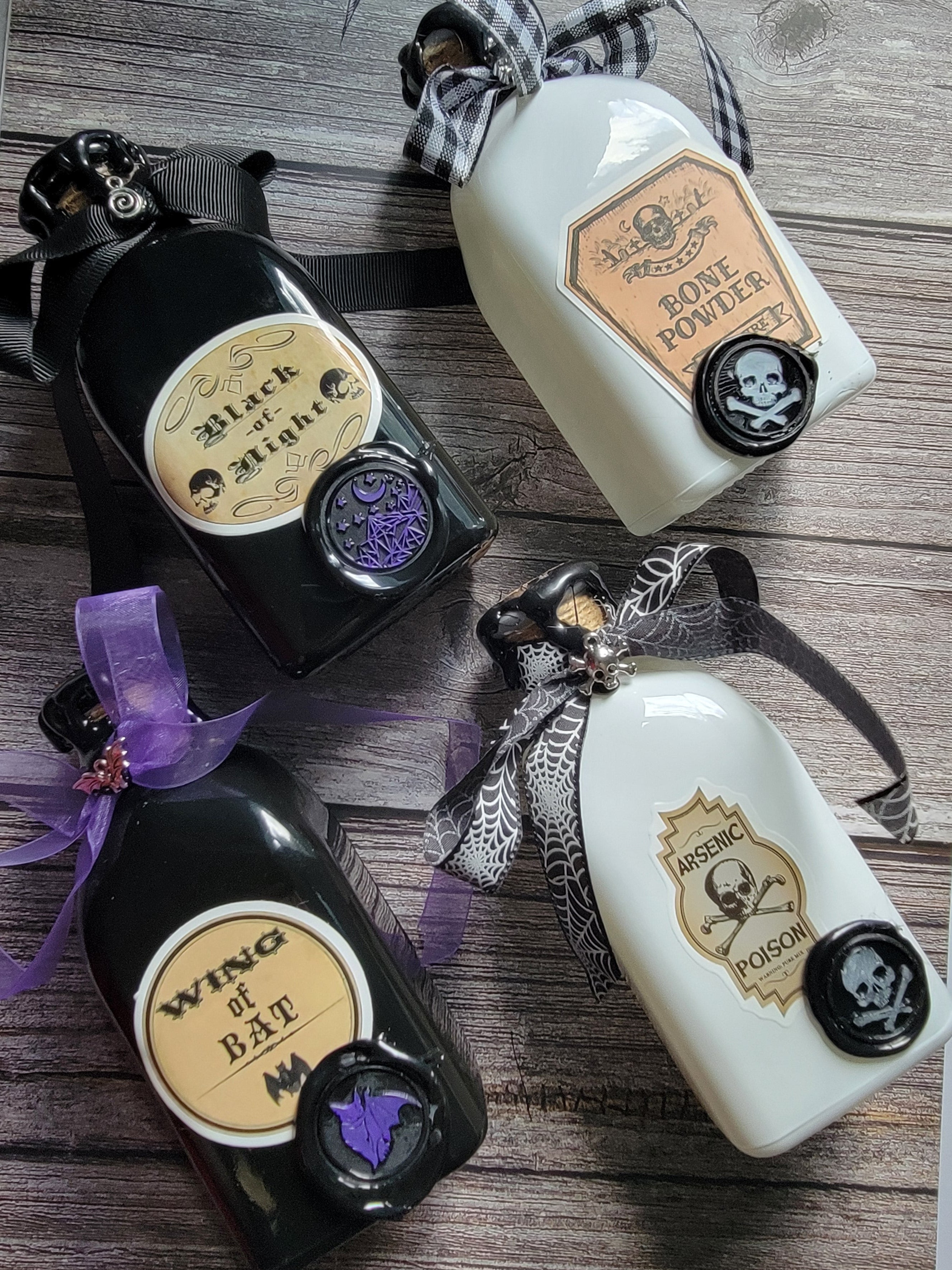 Wing of bat, bone powder, black of night and arsenic poison bottle bottles for witchy fans, Halloween decor or everyday gothic aesthetics. 