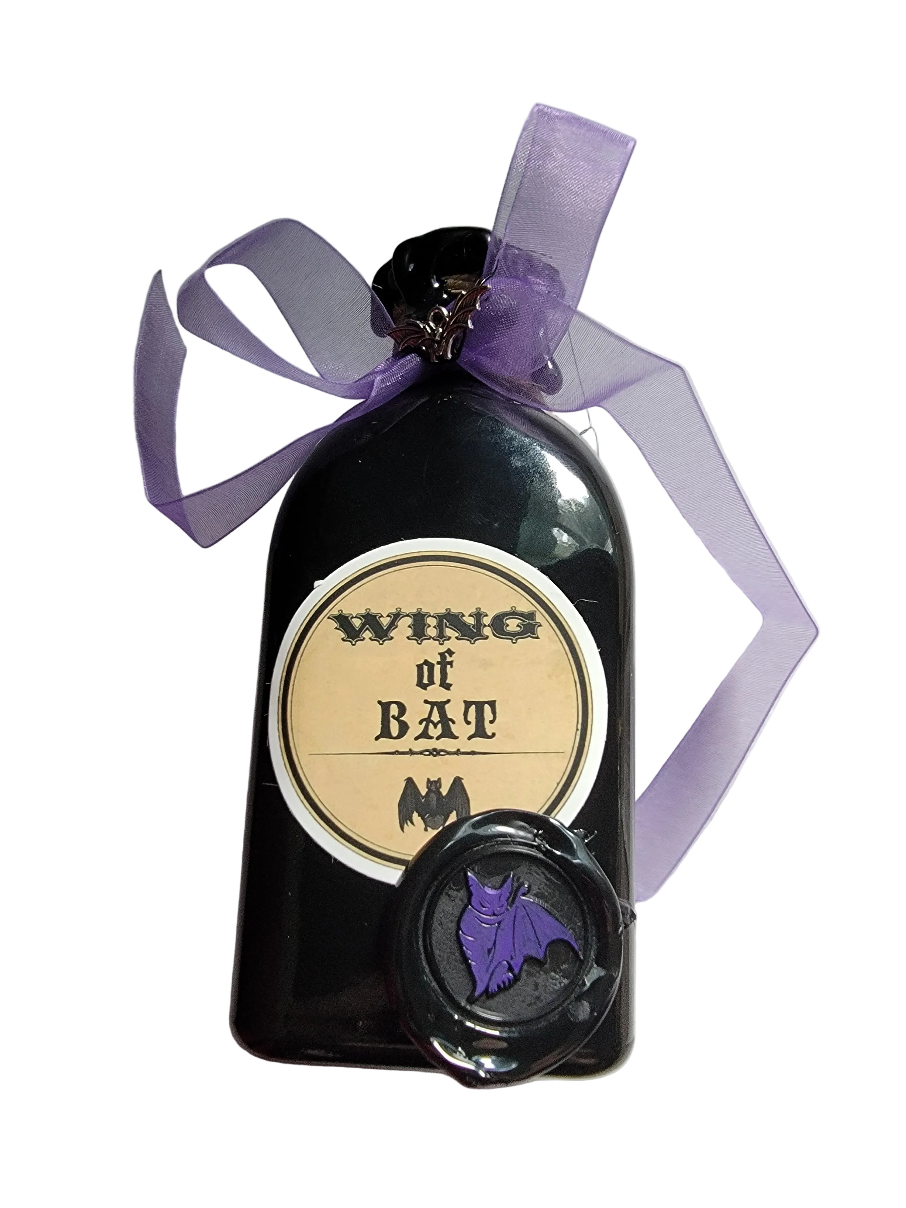 Black potion bottle wing of bat for witchy aesthetics, goth lovers and Halloween enthusiasts. 