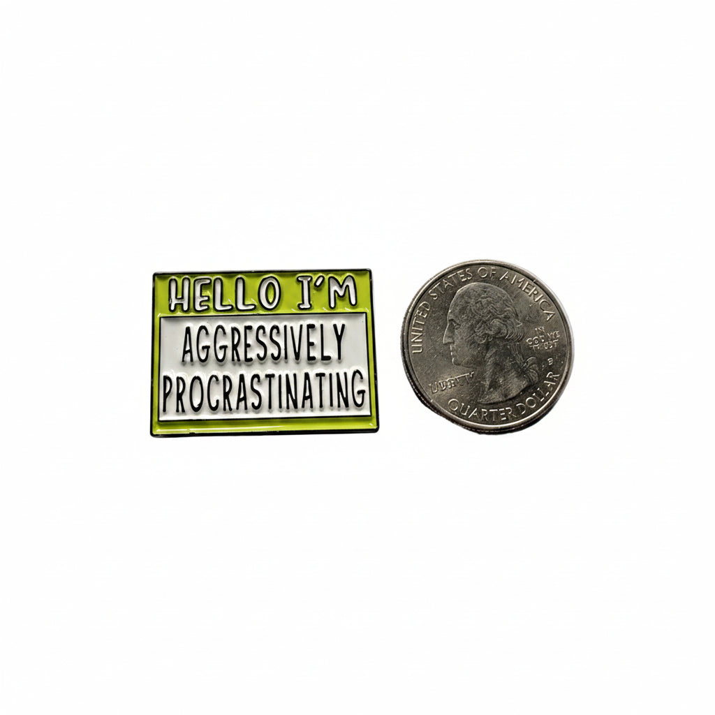 Hello I'm aggressively procrastinating enamel pin shown next to quarter for size reference sassy enamel pin dims 1 1/8 in W x 7/8 in H