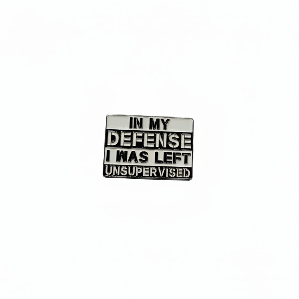 In my defense i was left unsupervised enamel pin featuring black and white stripe design, funny gift for jackets and bags