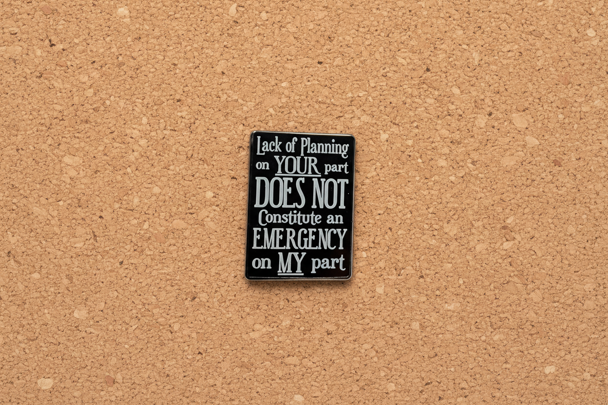 Black and white sign with funny quote on a cork background