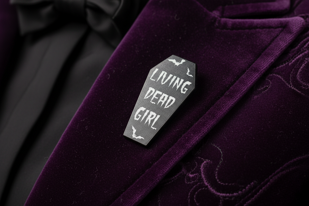 Living Dead Girl Enamel Pin worn on jacket lapel, spooky pin style for everyday wear