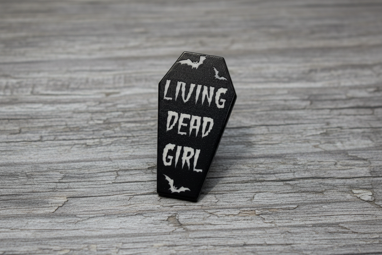 Living Dead Girl Enamel Pin on wood background witchy enamel pin with bats