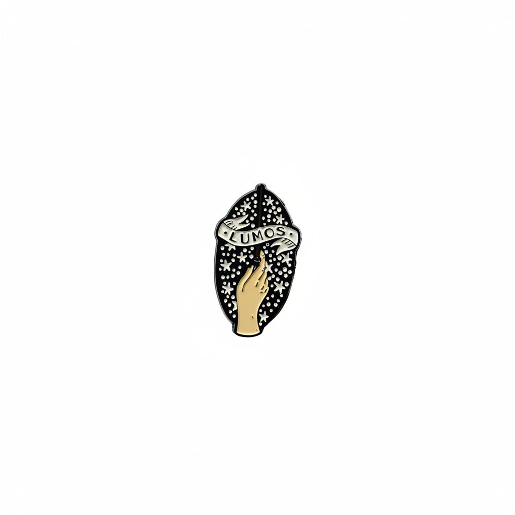 Lumos Enamel Pin featuring hand holding a wand design, witchy gift for jackets and bags 