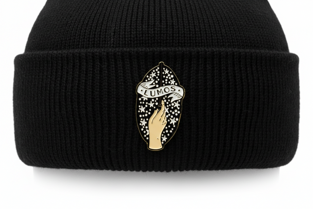 Lumos Enamel Pin worn on beanie hat alternative enamel pin for casual outfits and street wear
