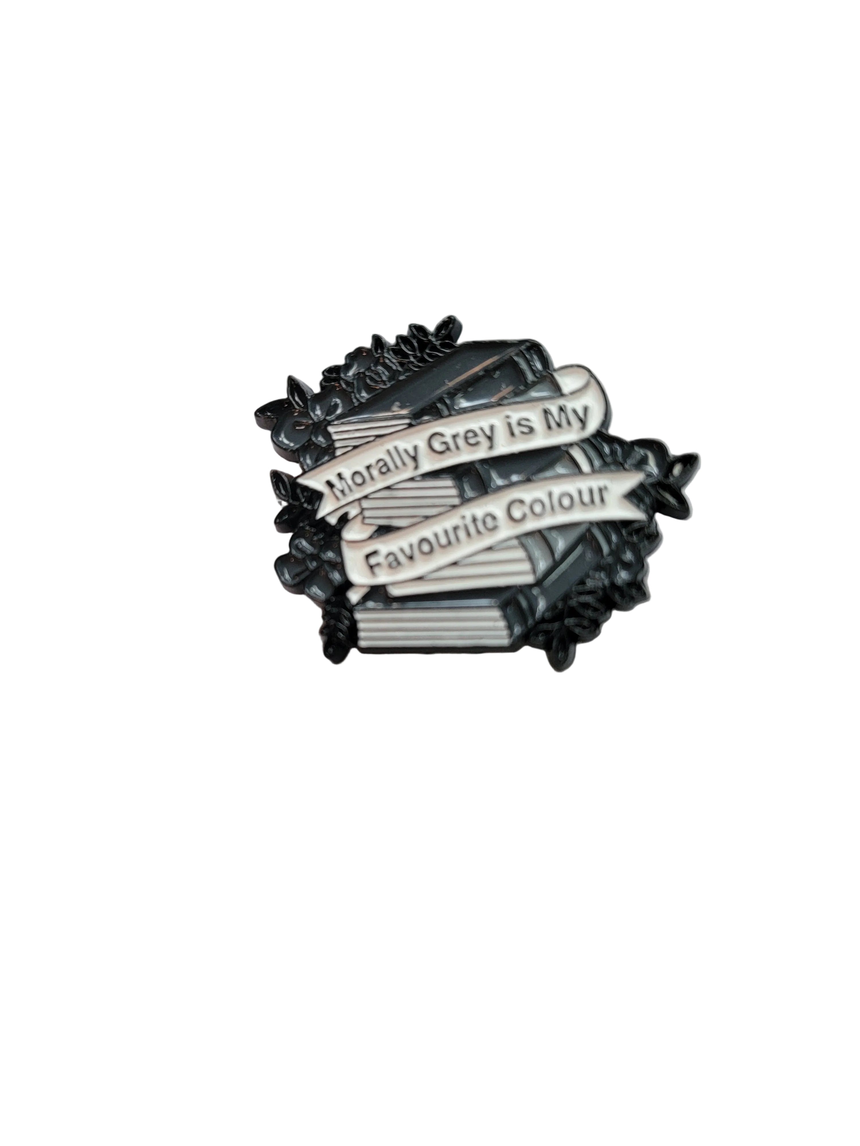 Three books stacked on a white background