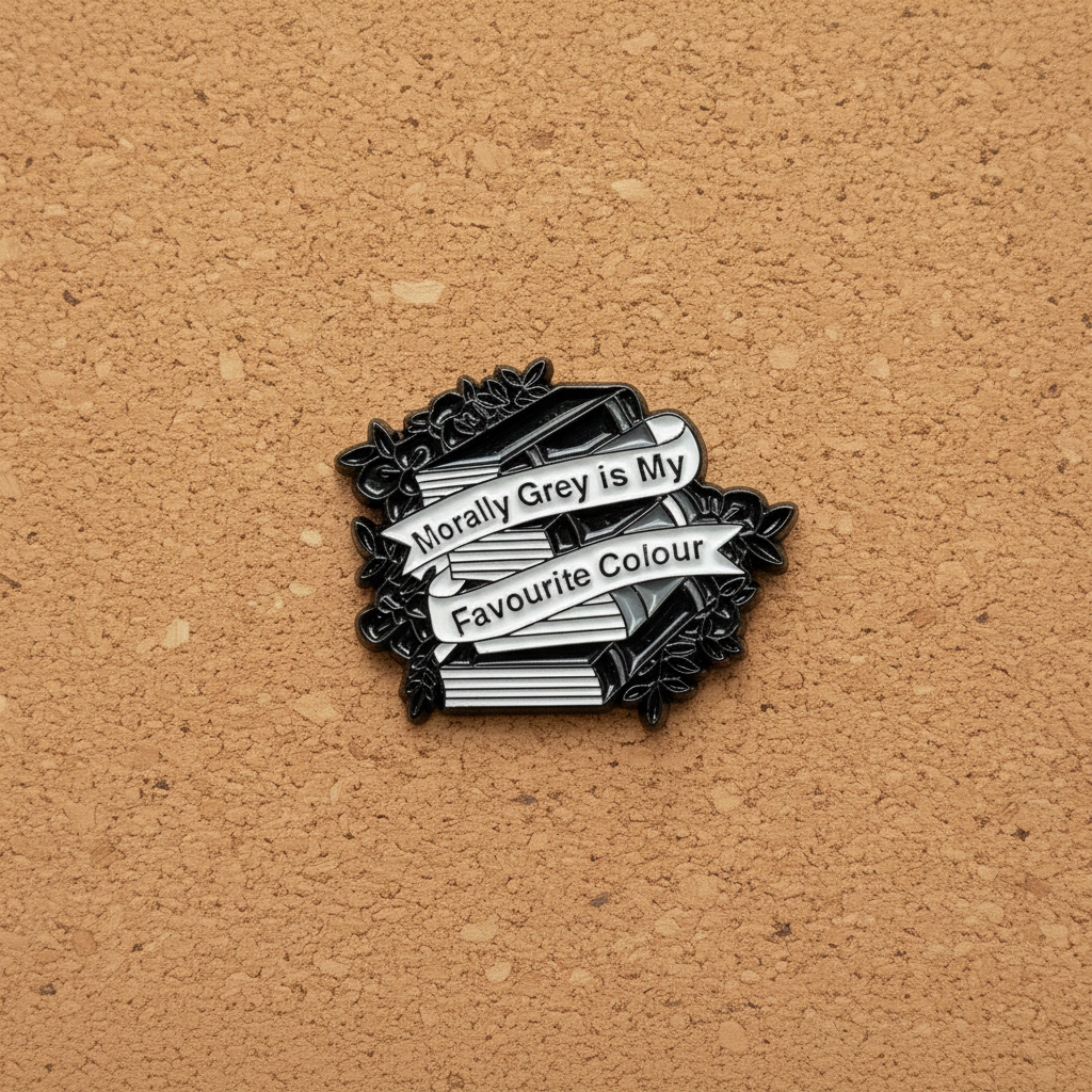 Morally grey enamel pin displayed on cork board bookish enamel pin for collectors and display
