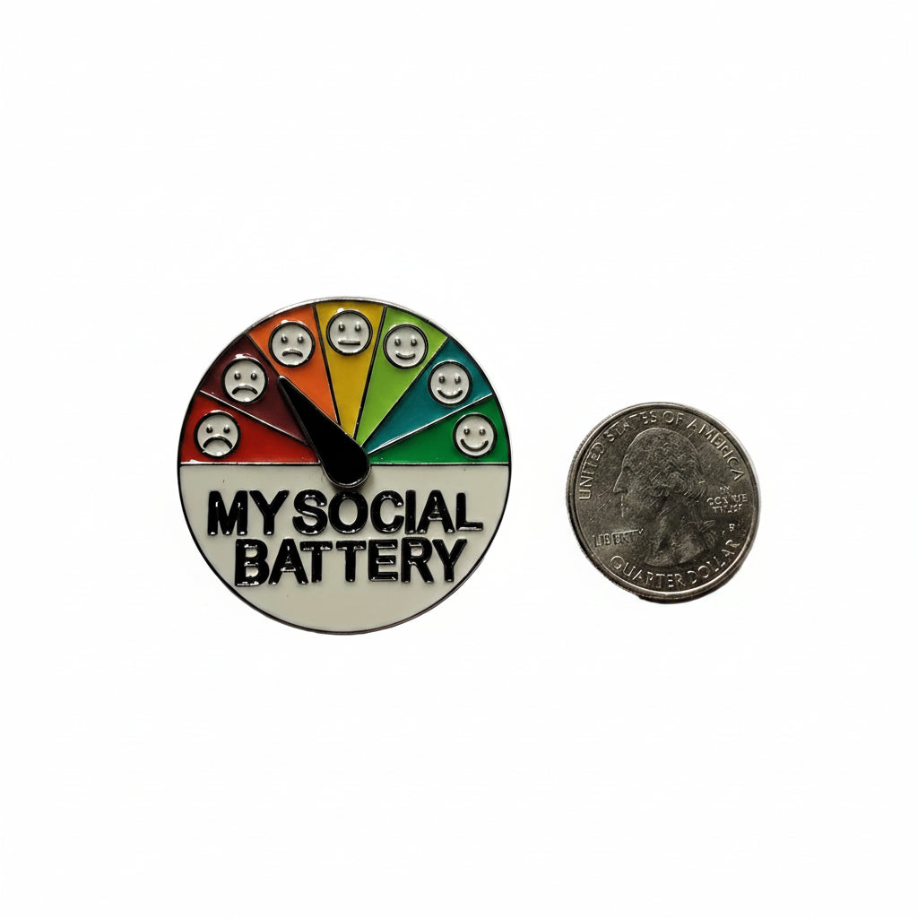 My social battery enamel pin shown next to quarter for size reference introvert enamel pin dims 1 1/2 in W x 1 1/2 in H