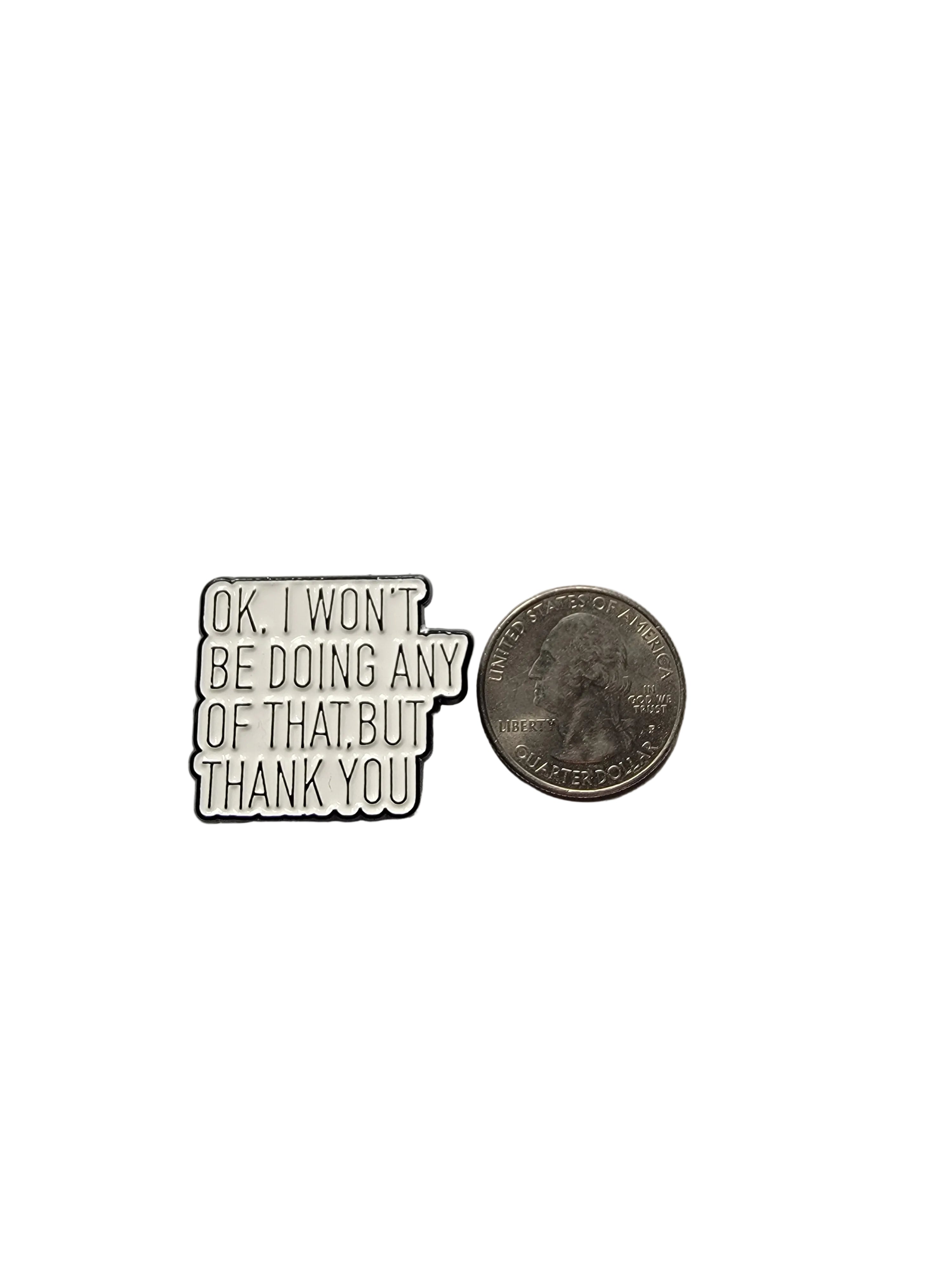 Metallic badge with text on a gray background