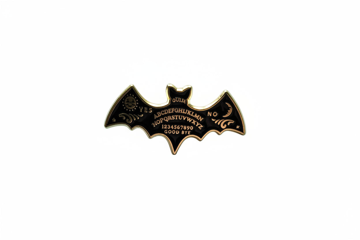 Ouija board enamel pin featuring bat shape, goth gift for jackets and bags 