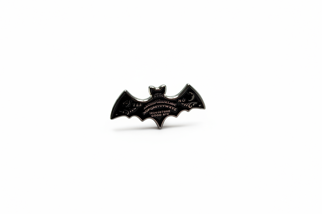 Ouija board enamel pin featuring bat shape, gothic gift for jackets and bags 