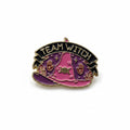 Team Witch Enamel Pin featuring pink witch hat design, spooky cute style gift for jackets and bag