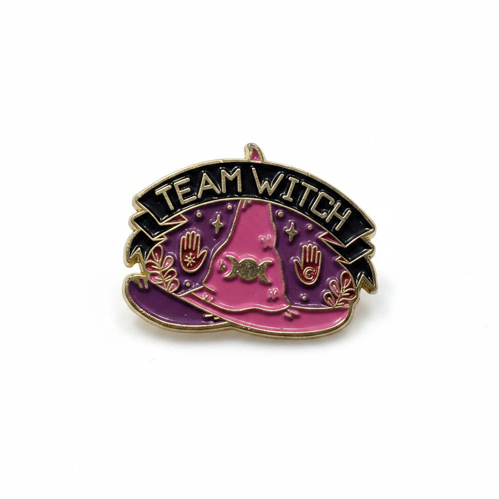 Team Witch Enamel Pin featuring pink witch hat design, spooky cute style gift for jackets and bag
