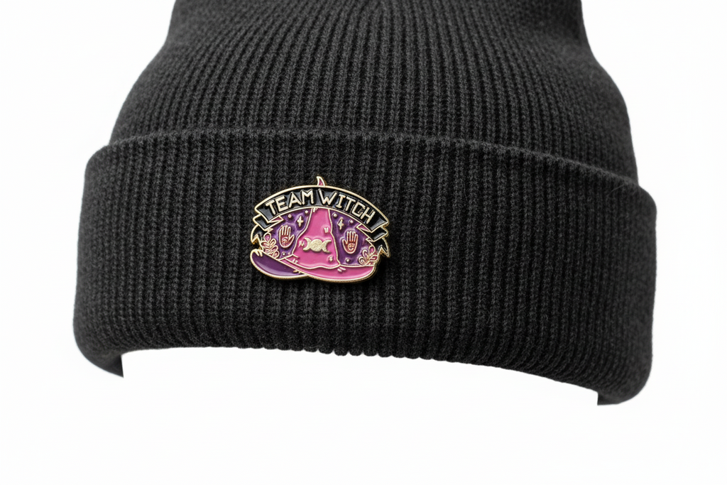 Team Witch Enamel Pin worn on beanie hat alternative enamel pin for casual outfits and street wear