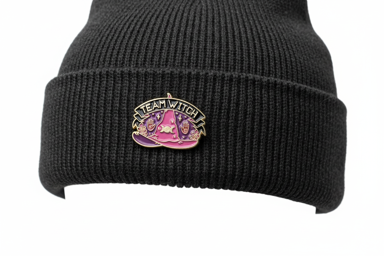 Team Witch Enamel Pin worn on beanie hat alternative enamel pin for casual outfits and street wear