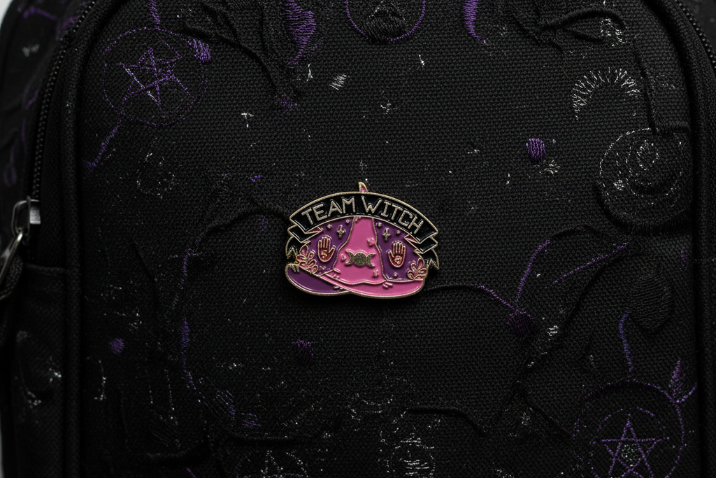 Team Witch Enamel Pin on backpack Halloween accessory for customizing bags and school gear