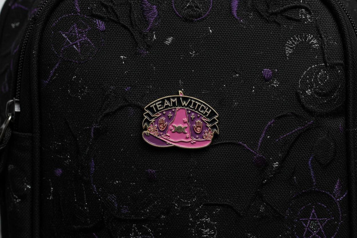 Team Witch Enamel Pin on backpack Halloween accessory for customizing bags and school gear