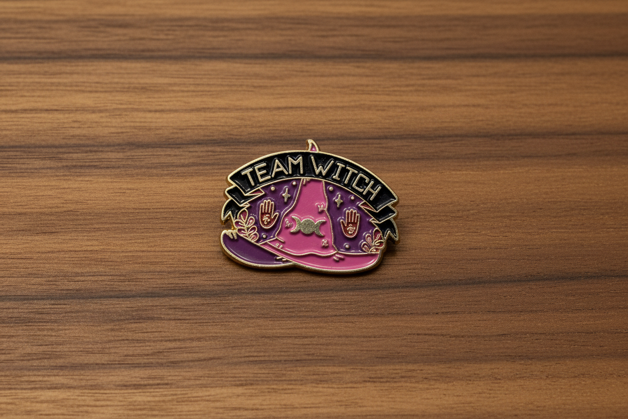 Team Witch Enamel Pin on wood background witch enamel pin with triple moon detail