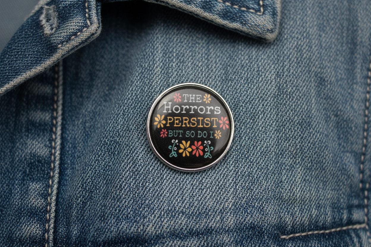 The Horrors Persist But So Do I Enamel Pin- Funny Meme Pin, Coworker Gift, Bookbag and Lapel Pin