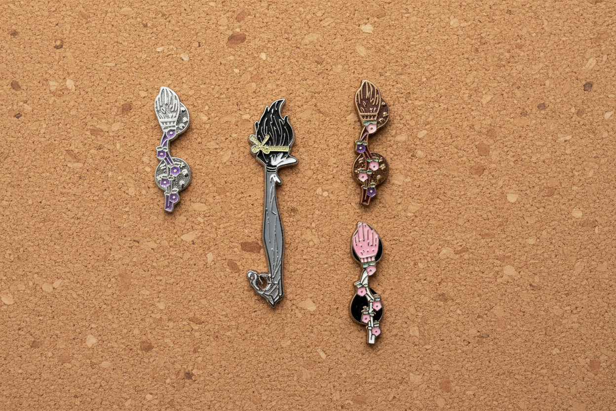 Witch Broom Enamel Pin Collection displayed on cork board Halloween enamel pin for collectors and display