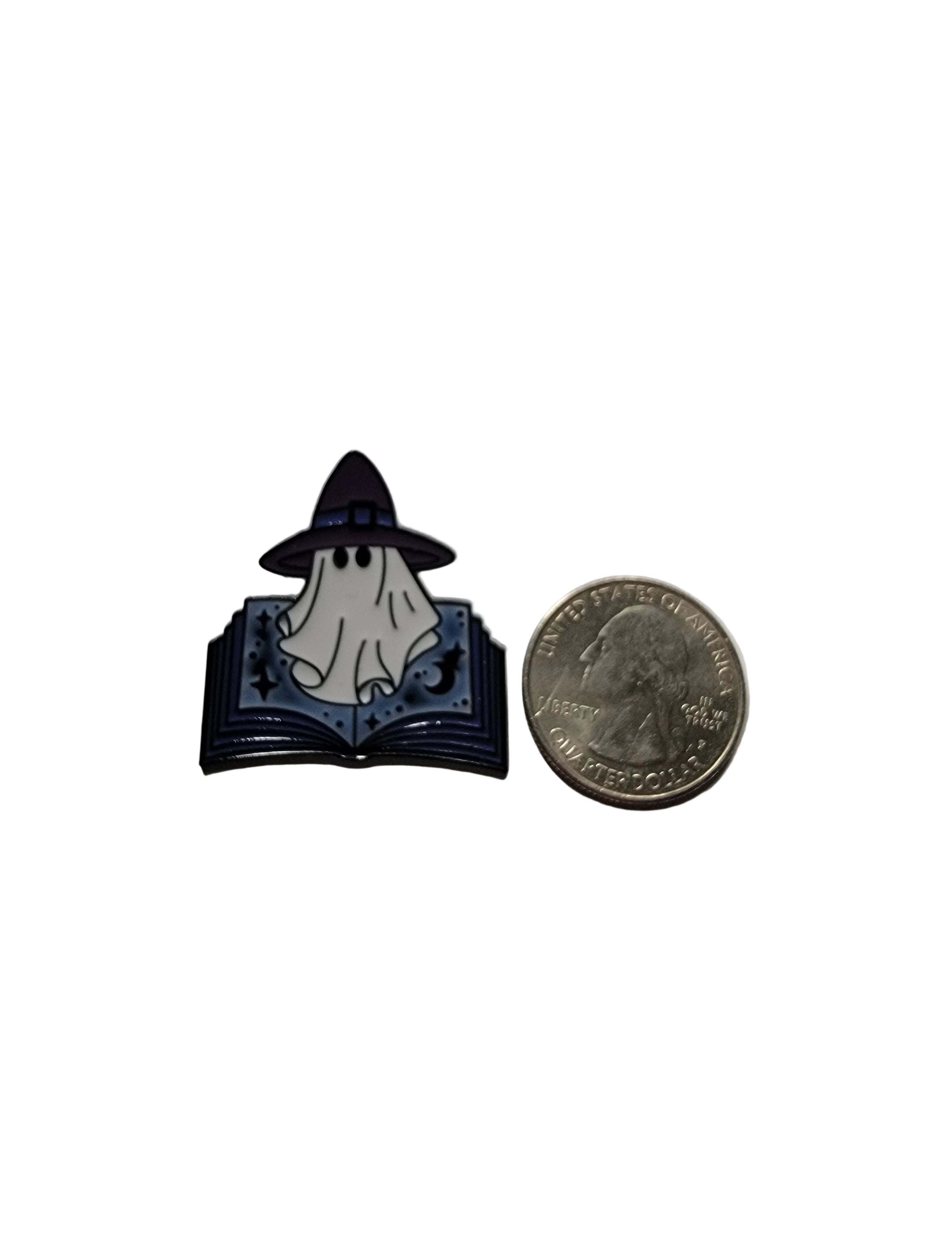 Withy Ghost Enamel Pin shown next to quarter for size reference alt enamel pin dims 1 1/8 in W x 1 1/4 in H