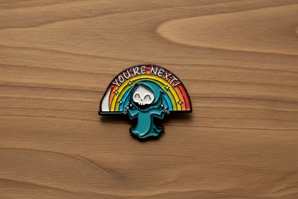 You're Next Enamel Pin on wood background funny enamel pin with rainbow detail