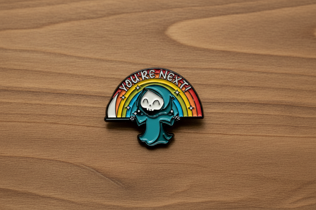 You're Next Enamel Pin on wood background funny enamel pin with rainbow detail