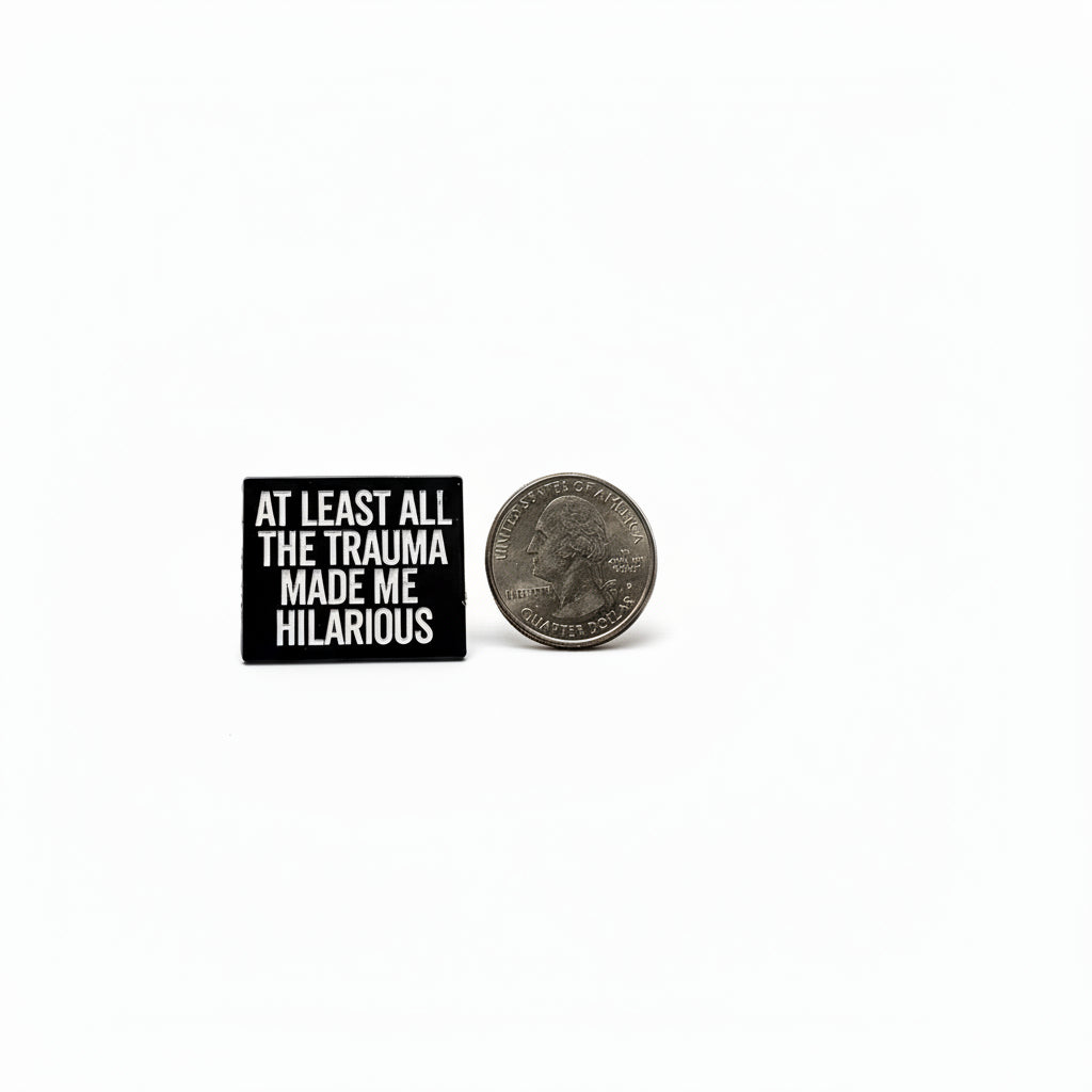 At least all this tramua made me hilarious enamel pin shown next to quarter for size reference funny enamel pin dims 3/8 W x 1H