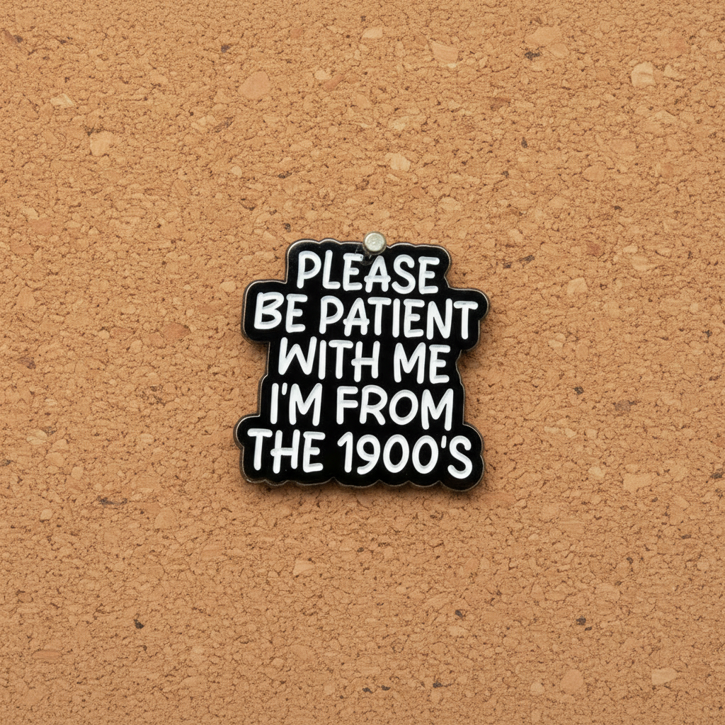 Please be patient with me i'm from the 1900s enamel pin displayed on cork board gen z enamel pin for collectors and display