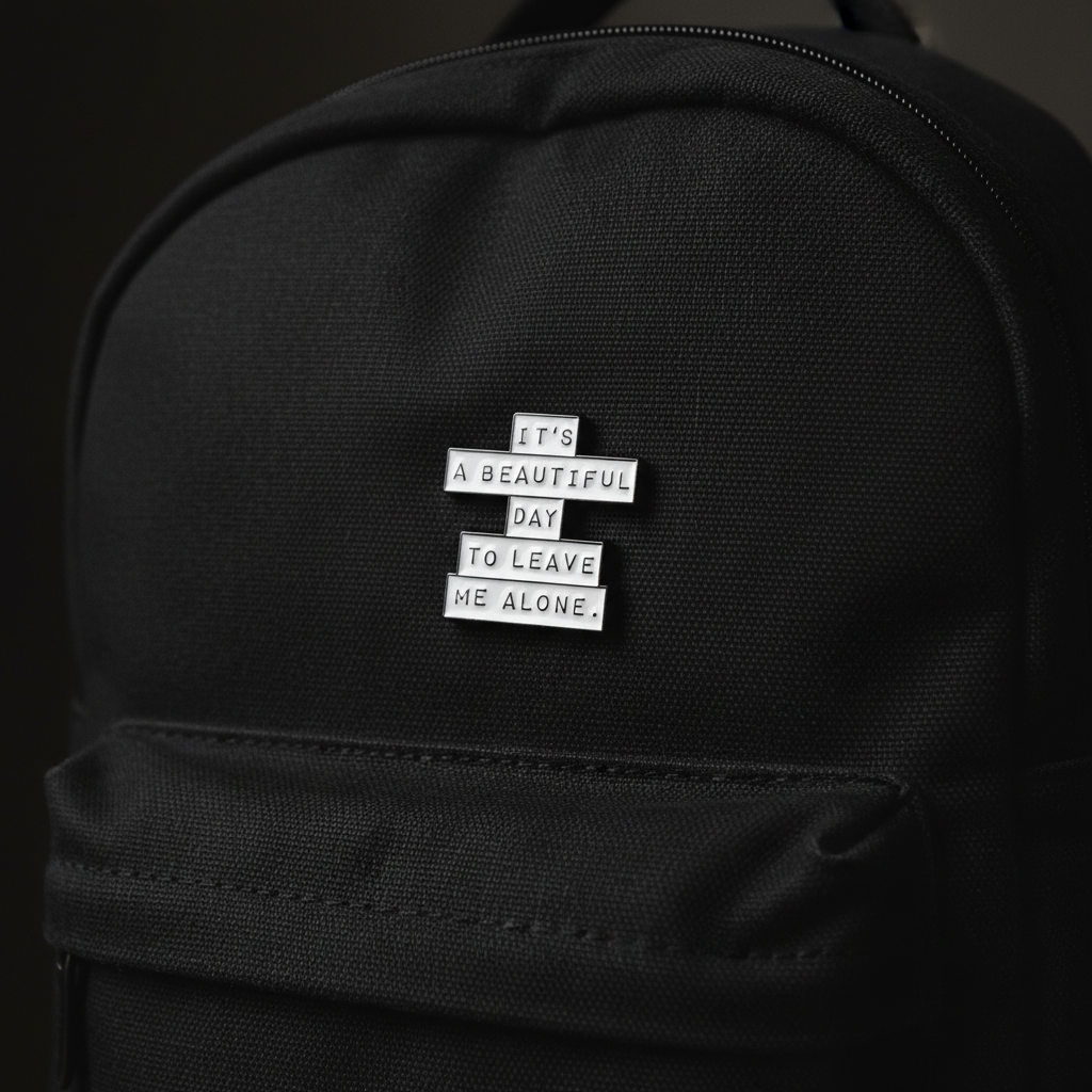 it's a beautiful day to leave me alone enamel pin on backpack mental health accessory for customizing bags and school gear