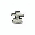 it's a beautiful day to leave me alone enamel pin featuring black and white text design, style gift for jackets and bags
