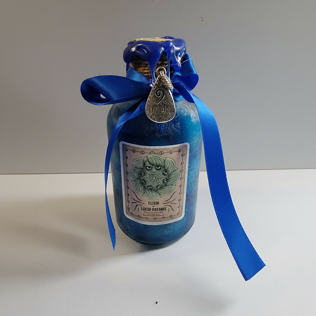 Blue bottle with a decorative label and ribbon on a white background