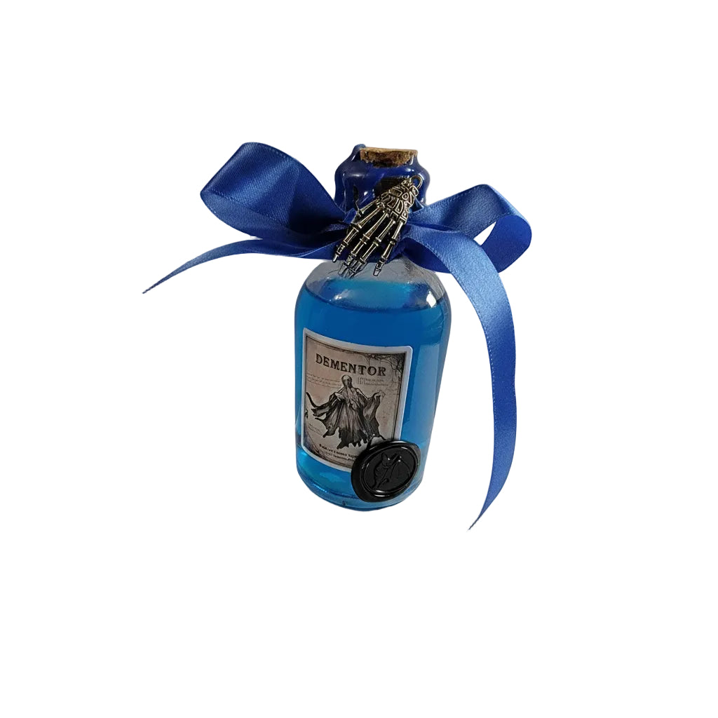 Small bottle with a blue ribbon and decorative label on a white background